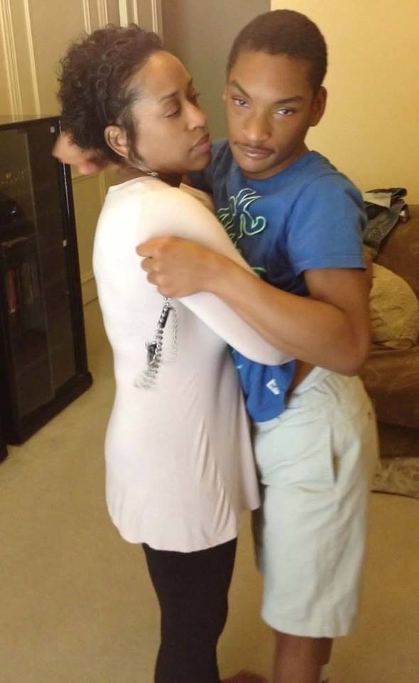Breggett Rideau hugging her son Terrence